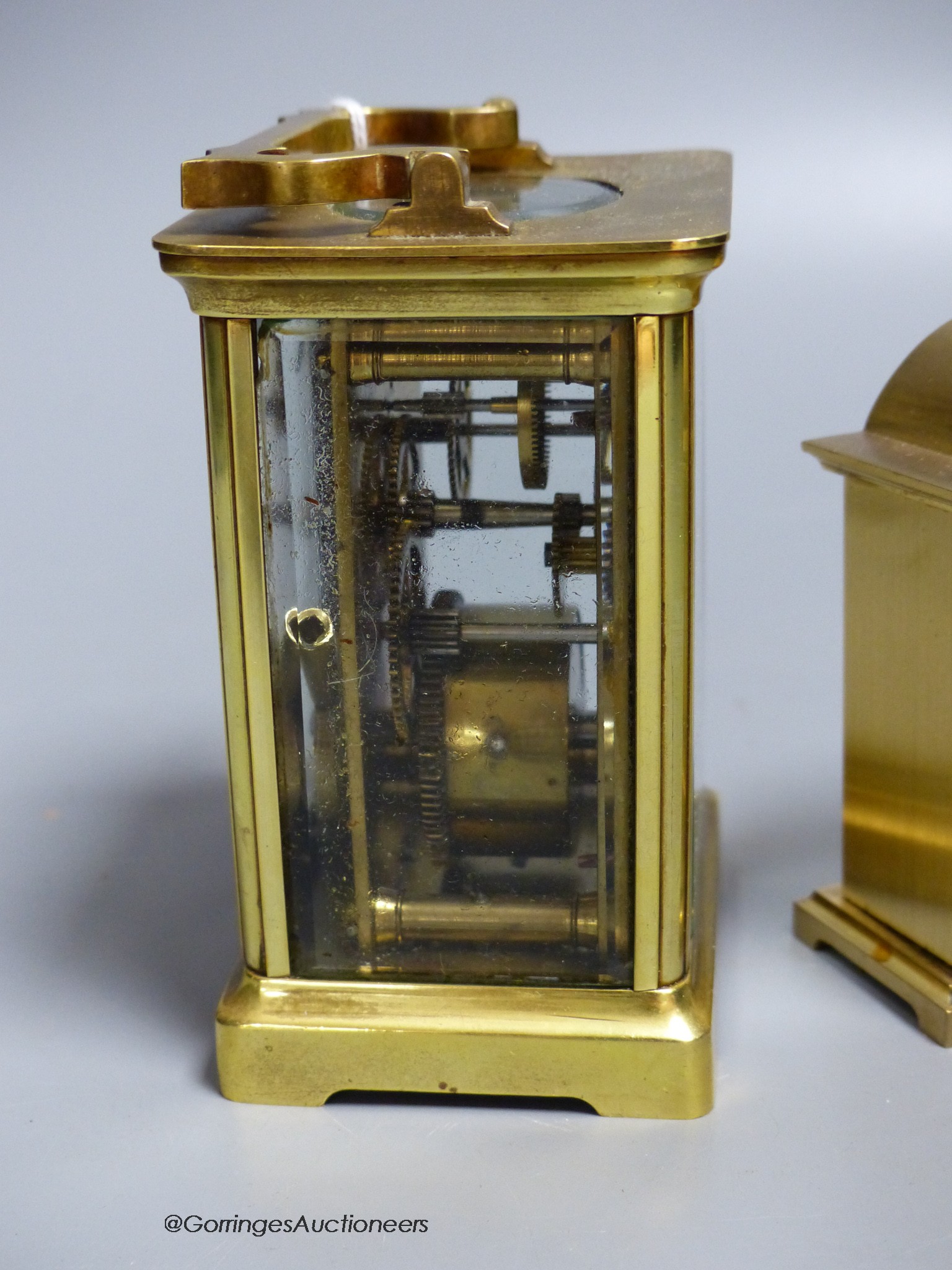 A brass carriage timepiece, 10.5cm and a carriage clock